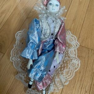 Vintage Spinning Porcelain Clown Figurine on Heart Pillow Music Box Pink & Blue